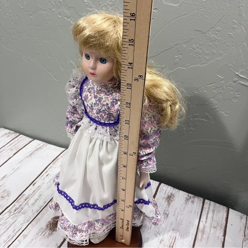 Porcelain Doll with purple floral dress and‎ Hat vintage